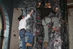 Henners and Claire Bear scale the climbing wall