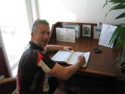 Day 10 - Signing the book at the finish