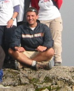 Pete cross-legged... on top of Ben Nevis