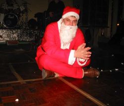 Pete cross-legged... in Lapland (2004 International Father Christmas Convention)