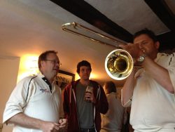 Ed struggling to get a sound out of his prize (see video!)