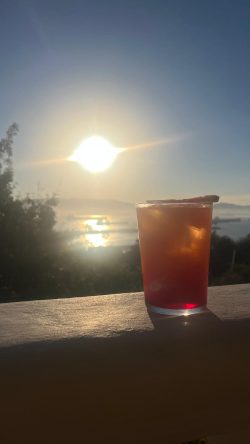 The specialty 'Gin on the Rock' cocktail overlooking the Strait of Gibraltar.